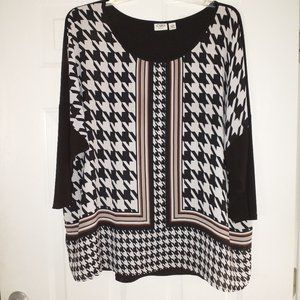 CATO black, white, and red top in very good condition. 29"L X 28" across bust